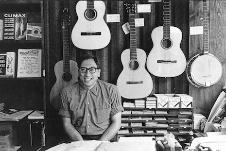 Izzy Young at his shop, circa 1960